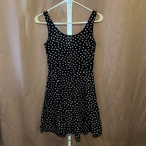 Polkadotted black dress